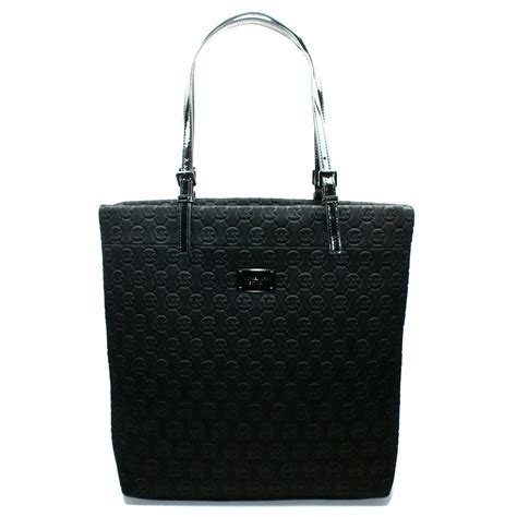 michael kors neoprene tote black|Michael Kors black leather purse.